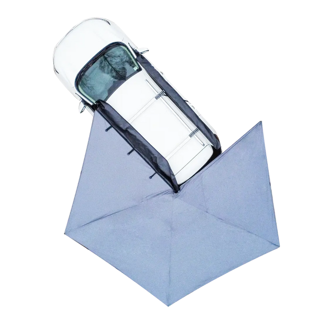 Naturnest 270-degree car awning extended from vehicle showing spacious shaded area with camping setup underneath