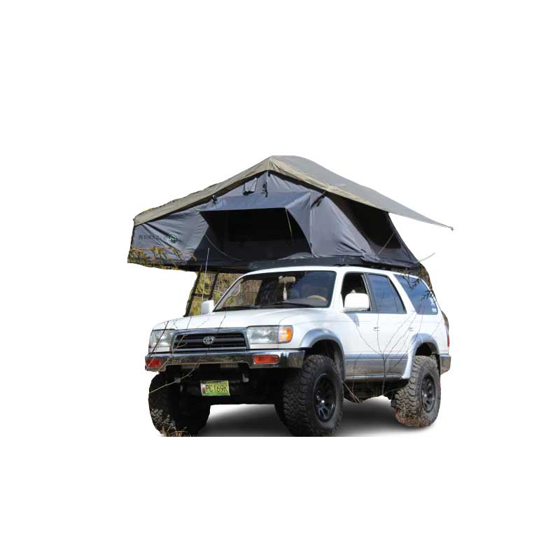 Overland Vehicle Systems Nomadic 2 Extended softshell roof top tent mounted on vehicle roof with ladder extended