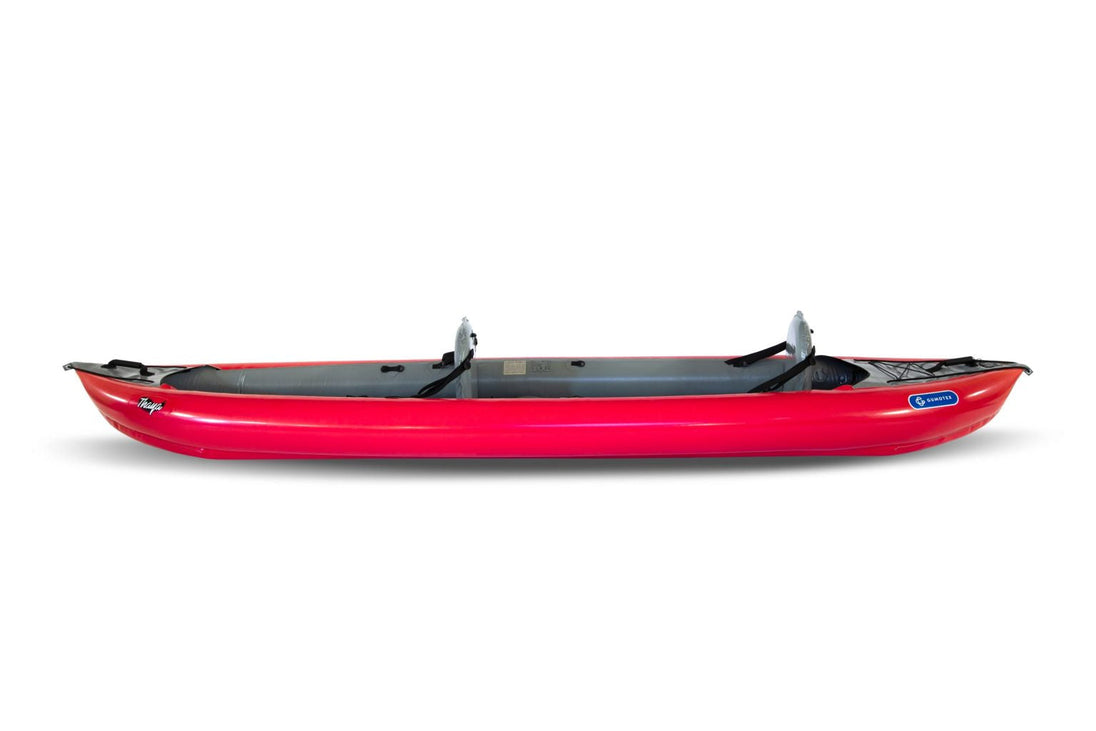 Red kayak on a white background
