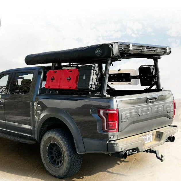 Overland Vehicle Systems Freedom Rack installed on truck bed with cross bars and side supports for cargo mounting