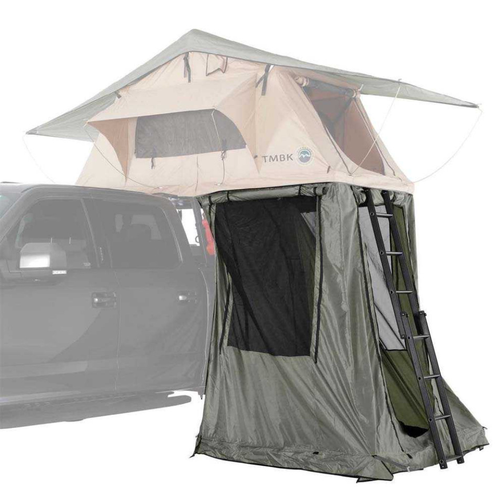 Overland Vehicle Systems LD TMBK rooftop tent annex attached to vehicle, showing extended living space with windows and weath