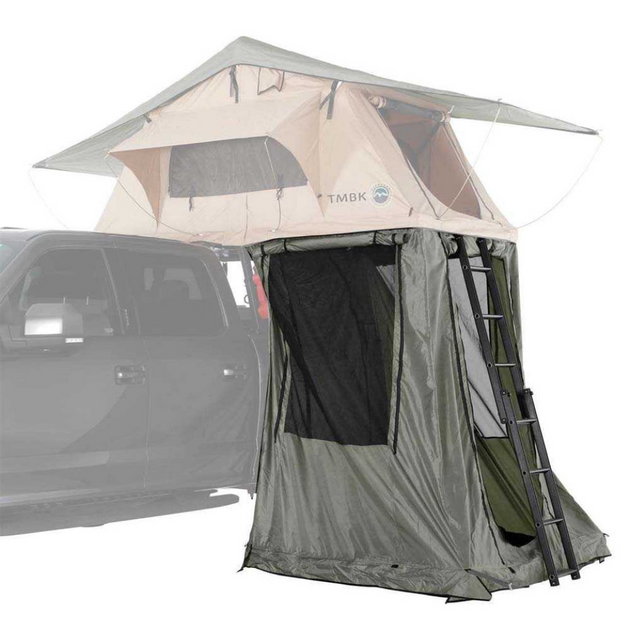 Overland Vehicle Systems LD TMBK rooftop tent annex attached to vehicle, showing extended living space with windows and weath