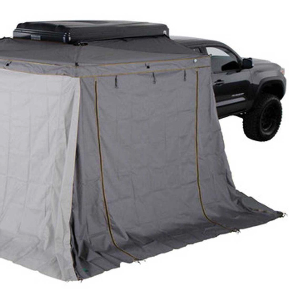 Overland Vehicle Systems Nomadic 270 LTE awning walls attached to vehicle passenger side creating enclosed shelter space
