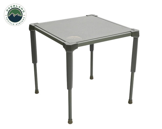 Overland Vehicle Systems compact camping table with anti-slip surface set up in outdoor environment