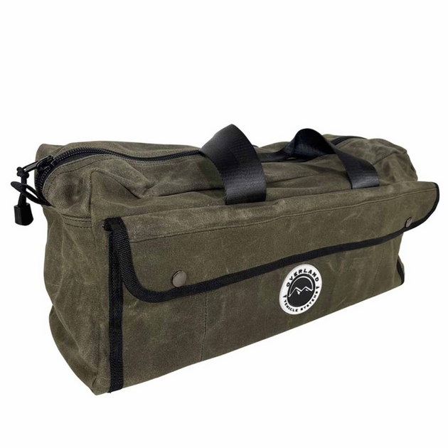 Overland Vehicle Systems small duffle bag made from durable #16 waxed canvas with reinforced handles and multiple storage com
