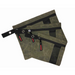 Set of three waxed canvas storage bags with leather handles and brass hardware on outdoor gear