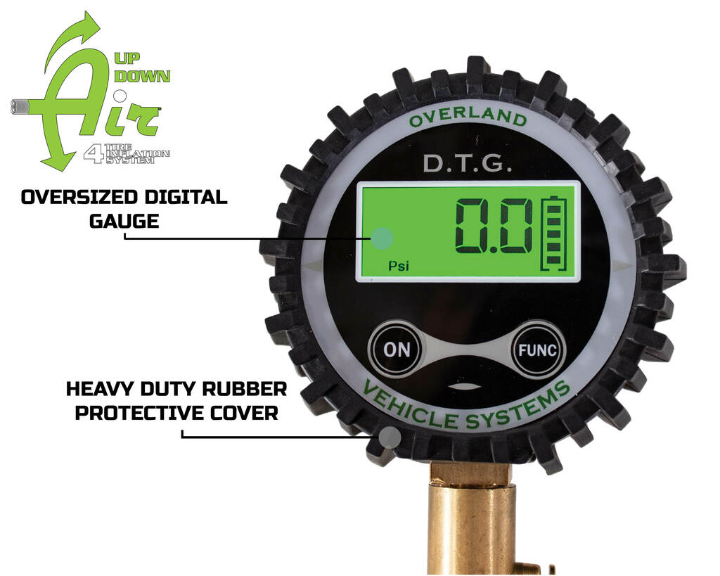 Overland Vehicle Systems digital tire gauge with valve kit showing LCD display and accessories on rugged surface