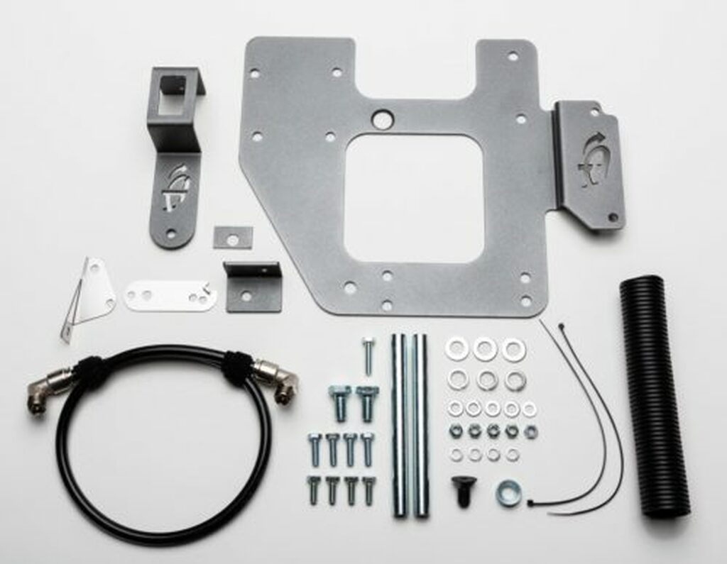 Overland Vehicle Systems Up Down Air mounting bracket installed with ARB CKMTA12 compressor in Jeep JK vehicle