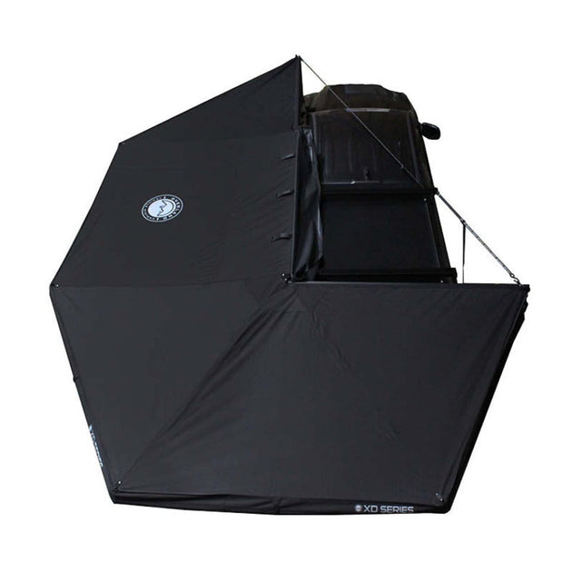 Overland Vehicle Systems XD Nomadic Awning deployed with 270-degree coverage showing integrated lighting system on vehicle