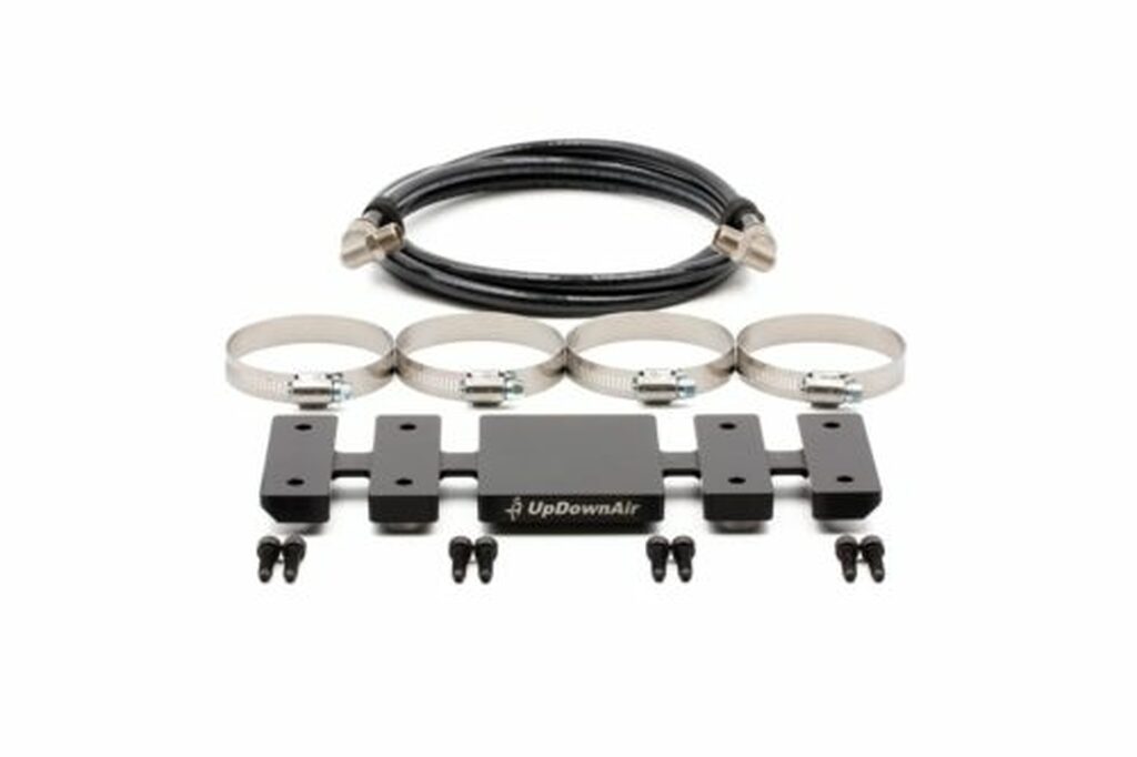 Overland Vehicle Systems UTV compressor bracket kit mounted securely with professional-grade hardware