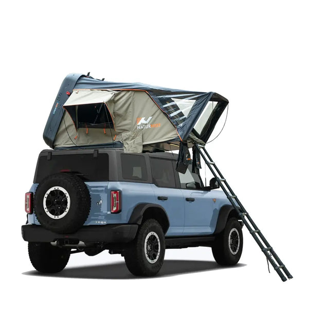 Naturnest Sirius 1 roof top tent mounted on vehicle with extended ladder and weather-resistant fabric