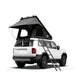 Naturnest Polaris Plus hard shell roof top tent mounted on vehicle with ladder extended