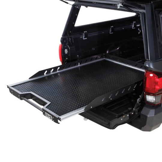 Overland Vehicle Systems bed extension installed on short bed pickup truck showing expanded cargo area
