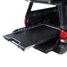 Overland Vehicle Systems bed extension installed on short bed pickup truck showing expanded cargo area