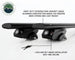 Overland Vehicle Systems Freedom Cross Bars mounted on vehicle roof rails with adventure gear attachment points