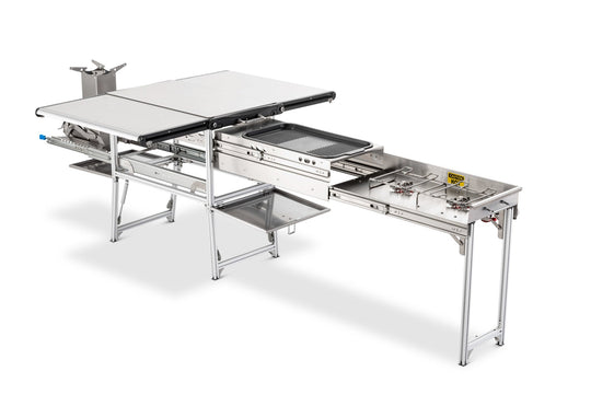 Overland Vehicle Systems Komodo Camp Kitchen setup with cooking surface, storage compartments, and foldable design for outdoo