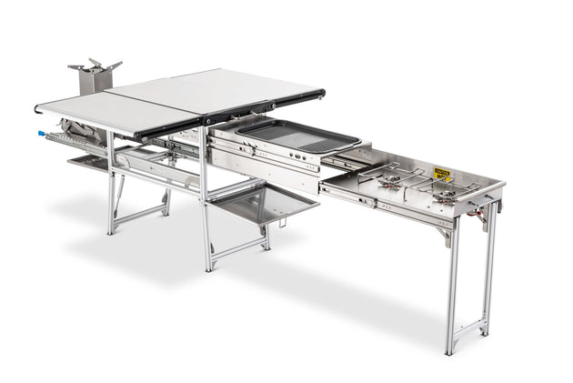 Overland Vehicle Systems Komodo Camp Kitchen setup with cooking surface, storage compartments, and foldable design for outdoo
