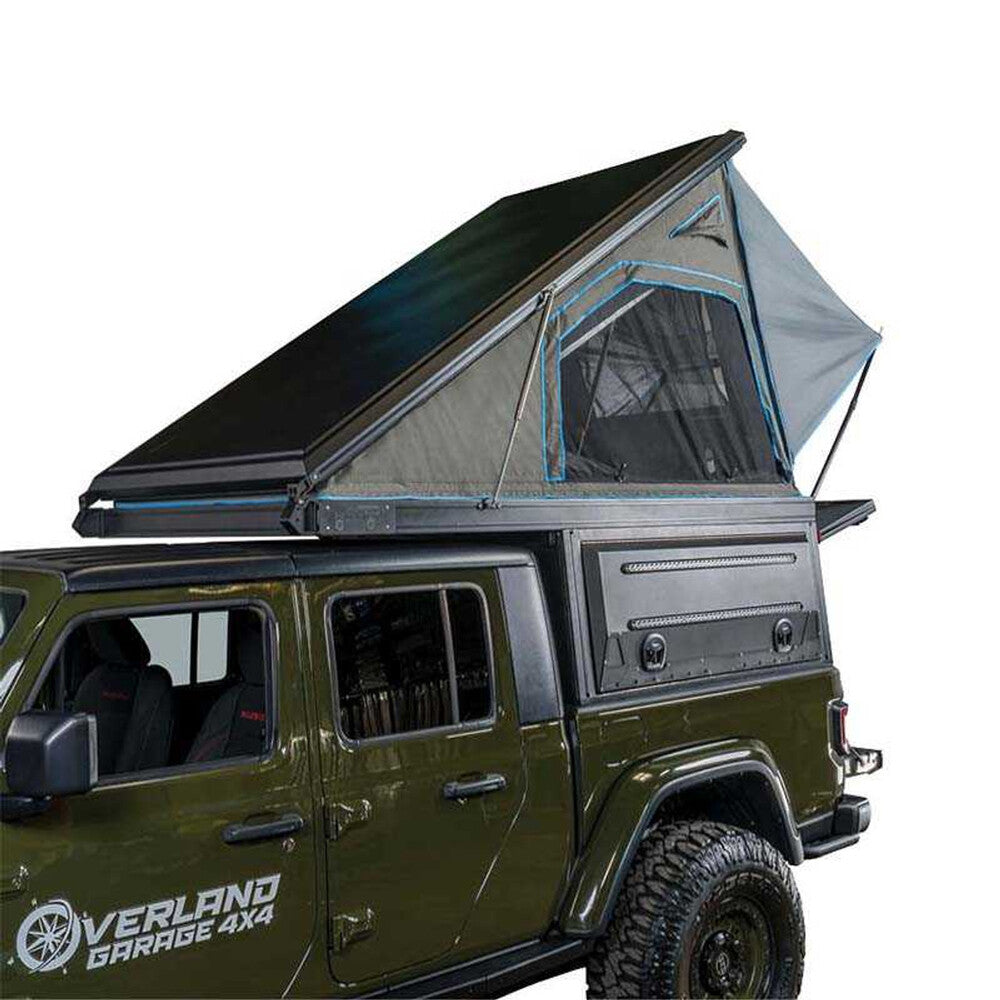 Overland Vehicle Systems MagPak camper shell tent combo installed on pickup truck with rooftop tent deployed