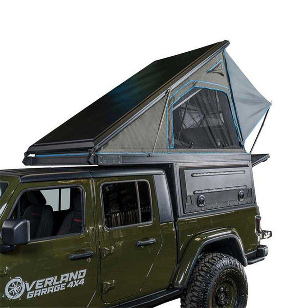 Overland Vehicle Systems MagPak camper shell tent combo installed on pickup truck with rooftop tent deployed