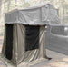 Overland Vehicle Systems Nomadic 3 roof top tent annex attached to vehicle with weather-resistant fabric and spacious interio