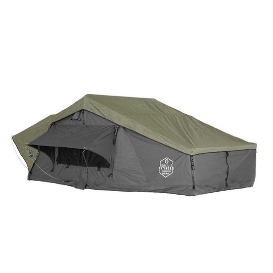 OVS Nomadic 3 Extended rooftop tent mounted on vehicle with ladder extended and annex room attached